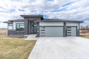 A one-story, grey-colored home built by Kruse Development in Central Iowa.