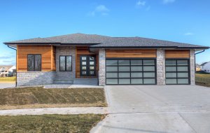 Wood and grey stone home built by Kruse Development.